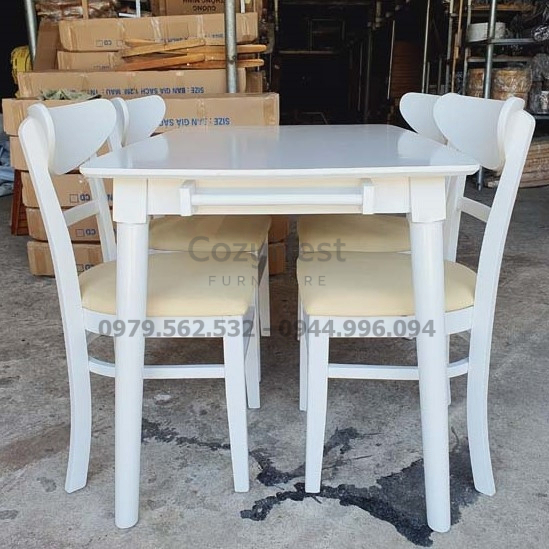 Bàn ăn vuông BBA15 với 4 ghế gỗ đệm kem êm ái, phù hợp không gian nhỏ